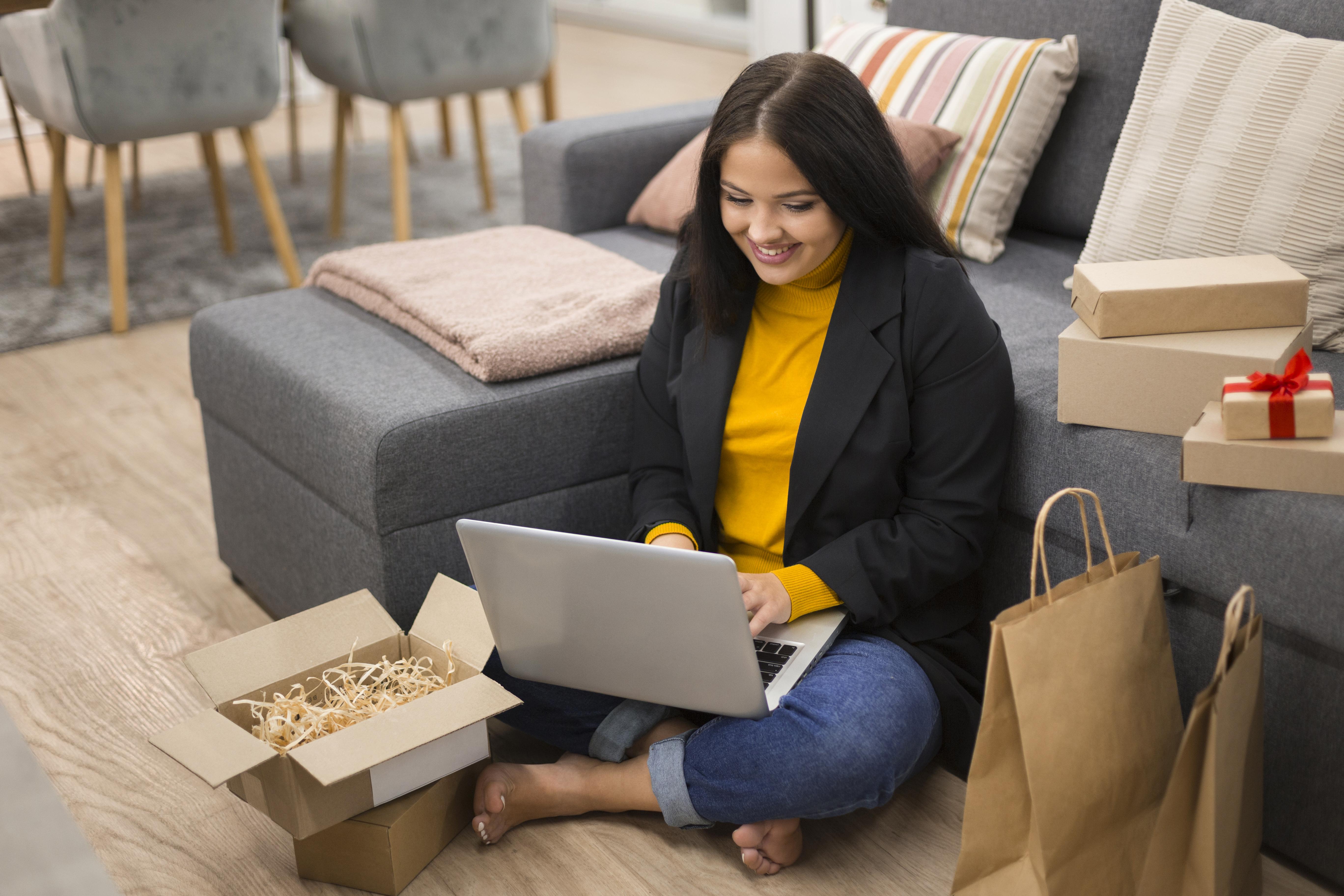 woman-sitting-floor-with-her-laptop-her-lap.jpg